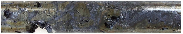 Massive sulphides – typical galena (grey-blue) with pyrite (bronze colour), diamond core from AF005, 82.1m. Strong lead mineralisation is intersected over 9.4m length in this particular hole.
