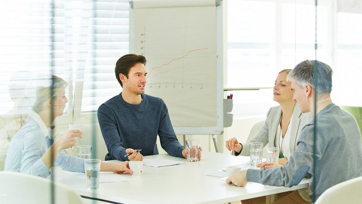 bigstock-Business-team-in-a-consulting&#8211;77053019